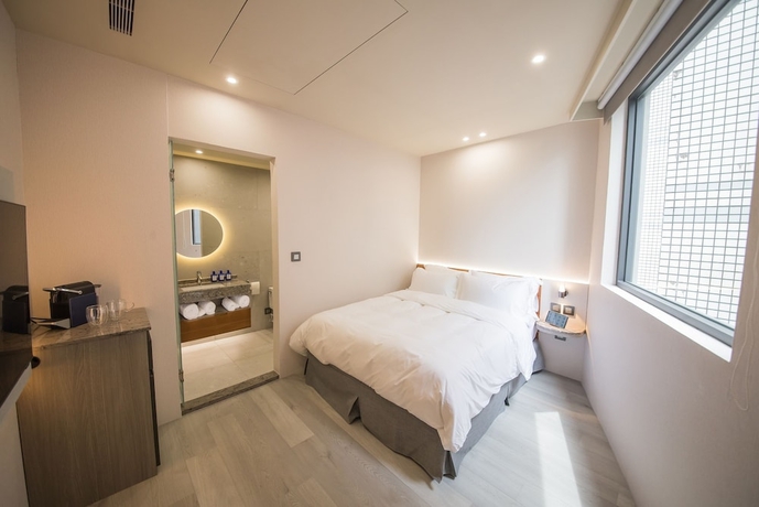 Imagen de la habitación del Hotel LIVIN, Jiaoxi. Foto 10