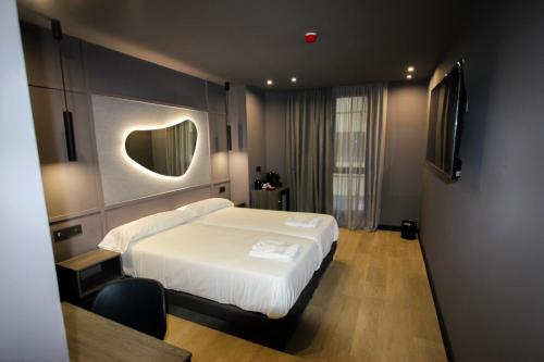 Imagen de la habitación del Hotel LIVVO La Escarlata. Foto 2