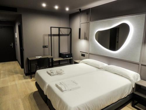 Imagen de la habitación del Hotel LIVVO La Escarlata. Foto 3