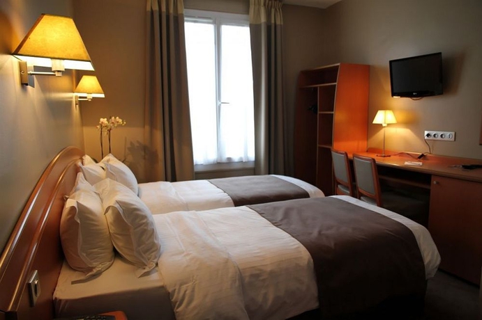 Imagen de la habitación del Hotel L'Interlude. Foto 4