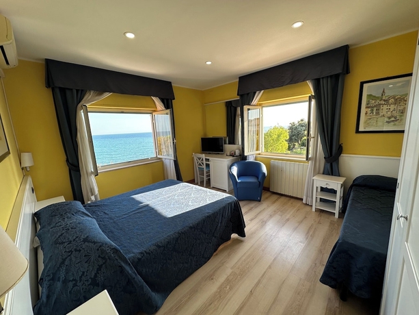 Imagen de la habitación del Hotel L\'Isola. Foto 13