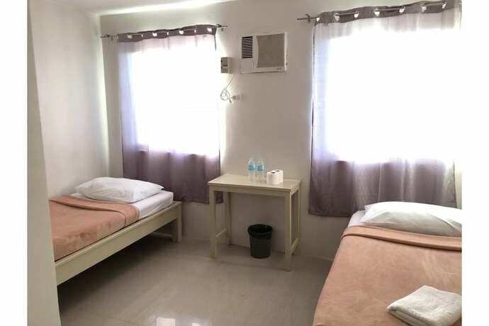 Imagen de la habitación del Hotel LOC Residence Inn. Foto 8