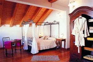 Imagen de la habitación del Hotel LOCANDA LOCATORI. Foto 3