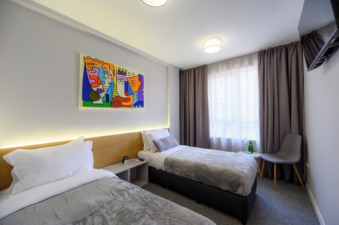 Imagen de la habitación del Hotel LOCATION HOTEL. Foto 5