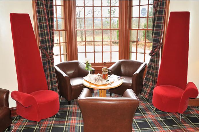 Imagen del bar/restaurante del Hotel LOCH NESS LODGE. Foto 3