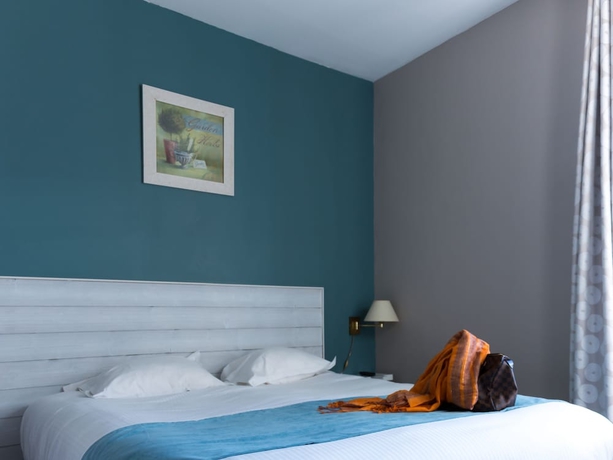 Imagen de la habitación del Hotel LOGIS Majestic Chatelaillon Plage - La Rochelle. Foto 5
