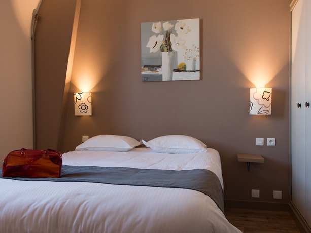 Imagen de la habitación del Hotel LOGIS Majestic Chatelaillon Plage - La Rochelle. Foto 10
