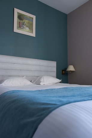Imagen de la habitación del Hotel LOGIS Majestic Chatelaillon Plage - La Rochelle. Foto 14