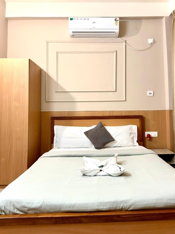 Imagen de la habitación del Hotel LOKTAK RESIDENCY. Foto 8