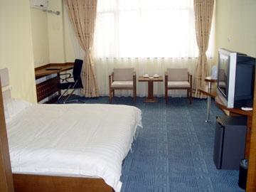 Imagen de la habitación del Hotel LONG WU JING PIN. Foto 4
