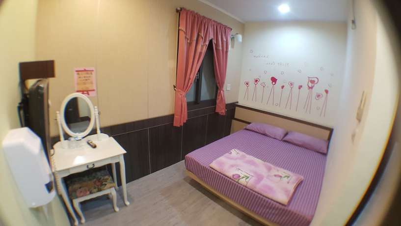 Imagen de la habitación del Hotel LONG YUAN HOTEL. Foto 4