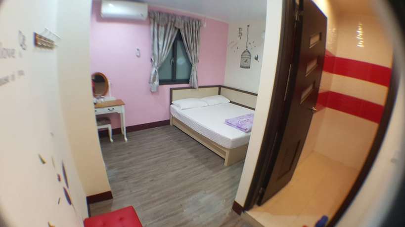 Imagen de la habitación del Hotel LONG YUAN HOTEL. Foto 15