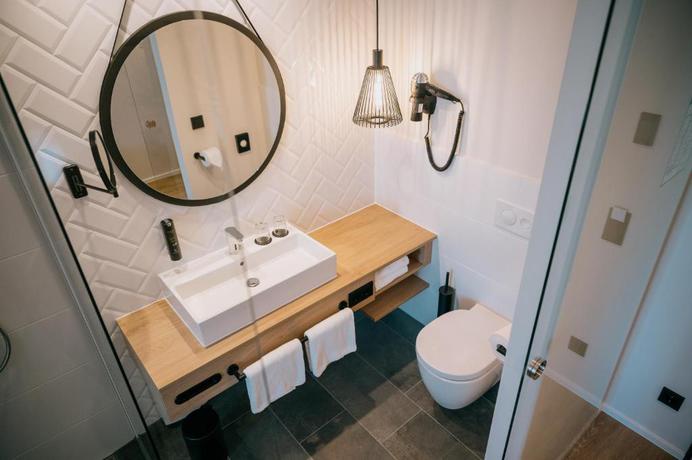 Imagen de la habitación del Hotel LOOM and Skybar. Foto 12