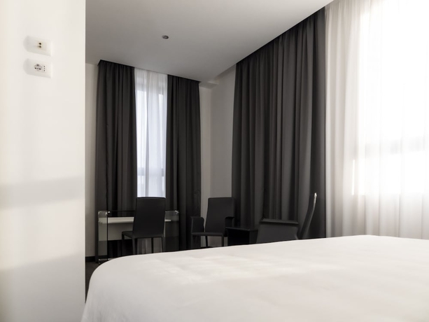 Imagen de la habitación del Hotel LOTO BUSINESS HOTEL. Foto 7