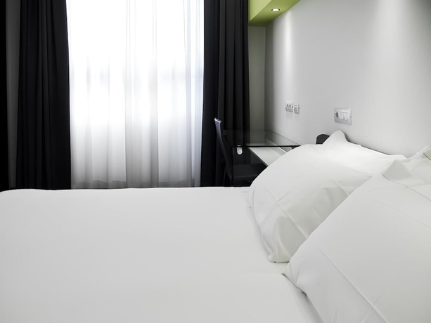 Imagen de la habitación del Hotel LOTO BUSINESS HOTEL. Foto 9