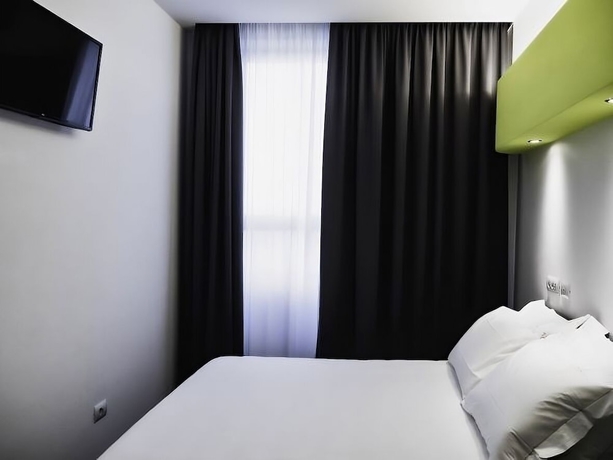 Imagen de la habitación del Hotel LOTO BUSINESS HOTEL. Foto 11