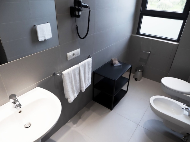 Imagen de la habitación del Hotel LOTO BUSINESS HOTEL. Foto 13