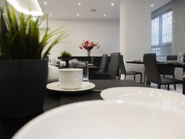 Imagen del bar/restaurante del Hotel LOTO BUSINESS HOTEL. Foto 2