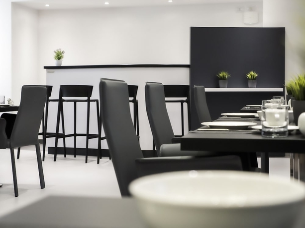 Imagen del bar/restaurante del Hotel LOTO BUSINESS HOTEL. Foto 5