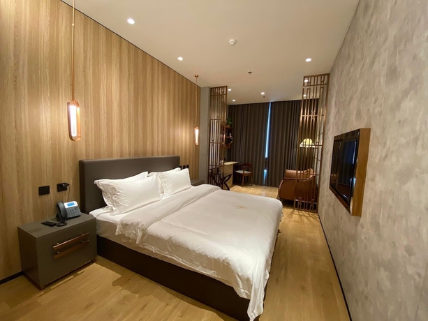 Imagen de la habitación del Hotel LOTUS BLU HOTEL NAGA. Foto 13