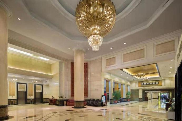 Imagen de los interiores del Hotel LOTUS HUATIAN HOTEL. Foto 8