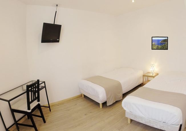 Imagen de la habitación del Hotel L\'Oustaou, LE LAVANDOU. Foto 7