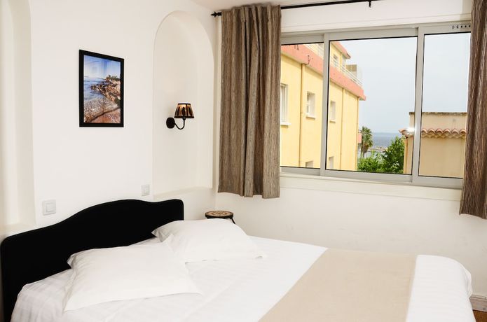 Imagen de la habitación del Hotel L\'Oustaou, LE LAVANDOU. Foto 12