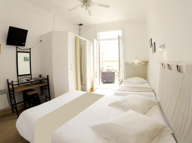 Imagen de la habitación del Hotel L\'Oustaou, LE LAVANDOU. Foto 18