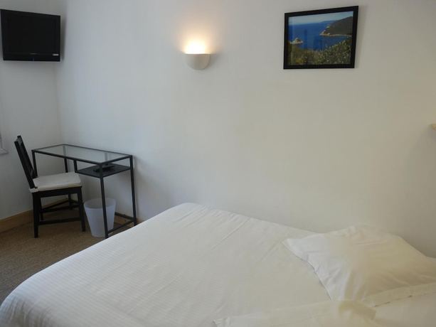 Imagen de la habitación del Hotel L\'Oustaou, LE LAVANDOU. Foto 19