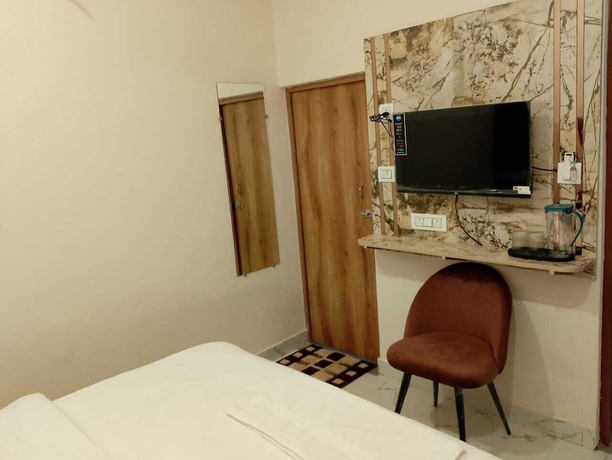 Imagen de la habitación del Hotel LR Delite Inn. Foto 4