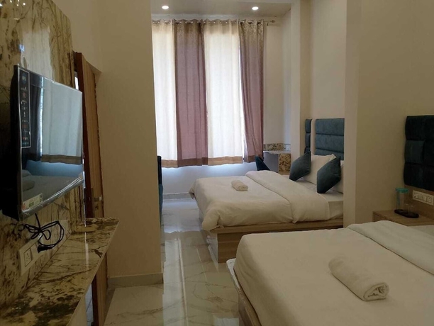 Imagen de la habitación del Hotel LR Delite Inn. Foto 5