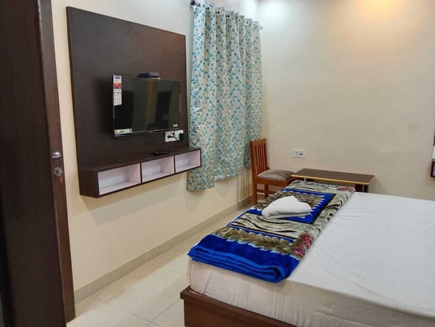 Imagen de la habitación del Hotel LS Grand Guest House. Foto 4