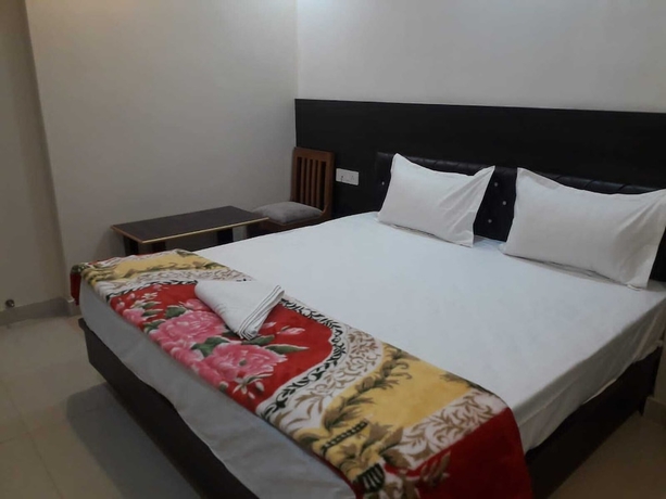 Imagen de la habitación del Hotel LS Grand Guest House. Foto 9