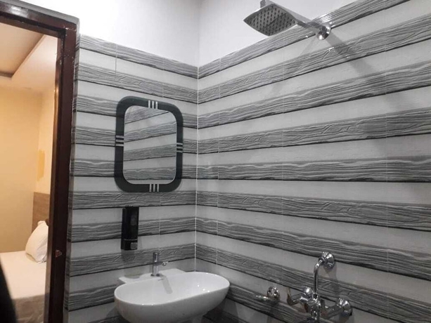 Imagen de la habitación del Hotel LS Grand Guest House. Foto 12