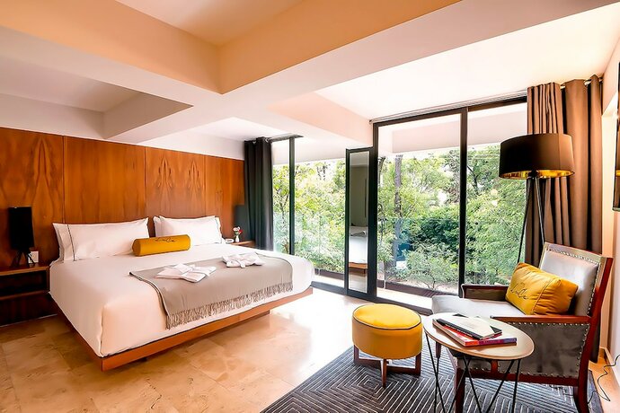 Imagen de la habitación del Hotel LUCA. Foto 14