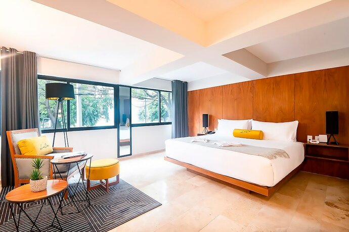 Imagen de la habitación del Hotel LUCA. Foto 20