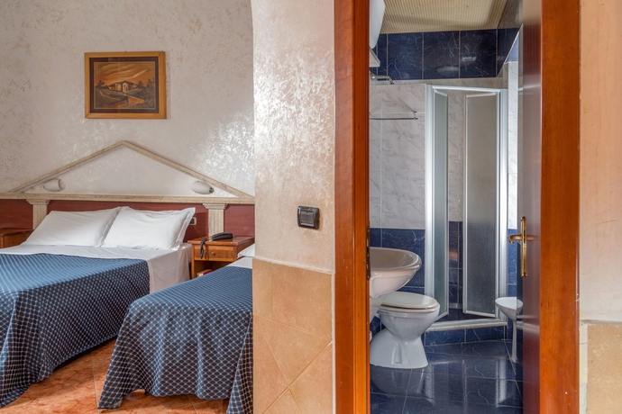 Imagen de la habitación del Hotel LUCIANI. Foto 4