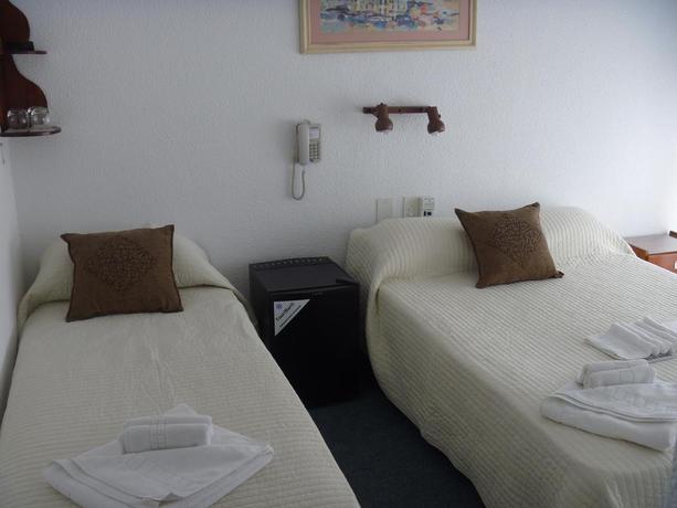 Imagen de la habitación del Hotel LUGRA HOTEL. Foto 3