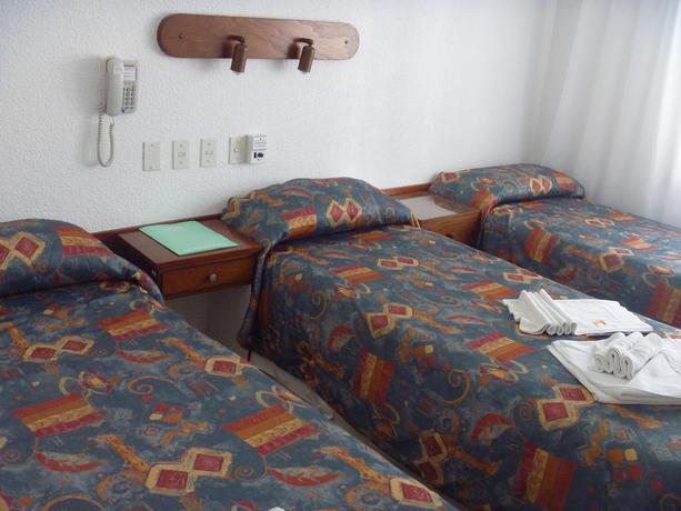 Imagen de la habitación del Hotel LUGRA HOTEL. Foto 4