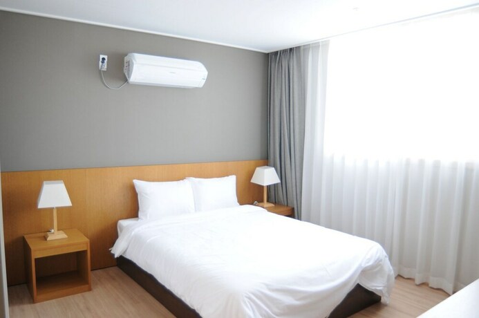 Imagen de la habitación del Hotel LUMIA Hotel and Resort. Foto 38