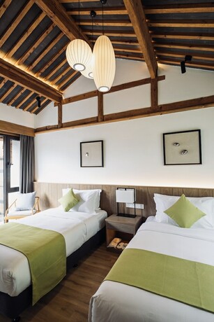 Imagen de la habitación del Hotel LUX Tea Horse Road Da Ju Village. Foto 19