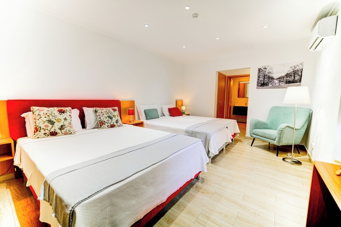 Imagen de la habitación del Hotel LUXURY PALM SUITES. Foto 1