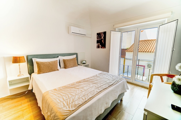 Imagen de la habitación del Hotel LUXURY PALM SUITES. Foto 3