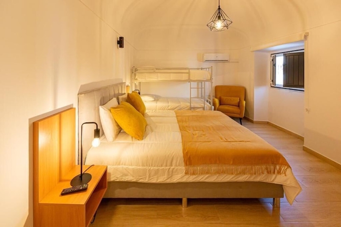 Imagen de la habitación del Hotel LUXURY PALM SUITES. Foto 5