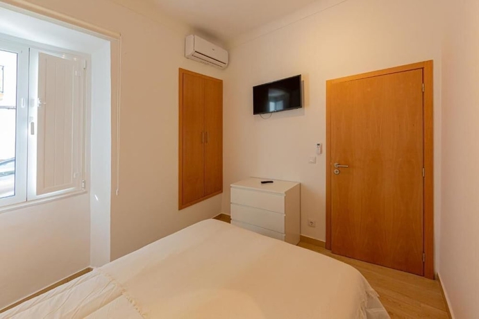 Imagen de la habitación del Hotel LUXURY PALM SUITES. Foto 6