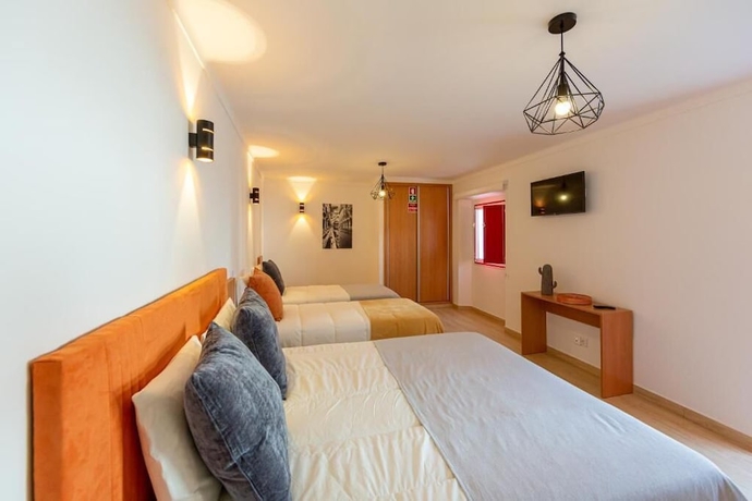 Imagen de la habitación del Hotel LUXURY PALM SUITES. Foto 8
