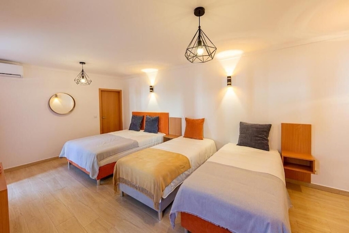 Imagen de la habitación del Hotel LUXURY PALM SUITES. Foto 9