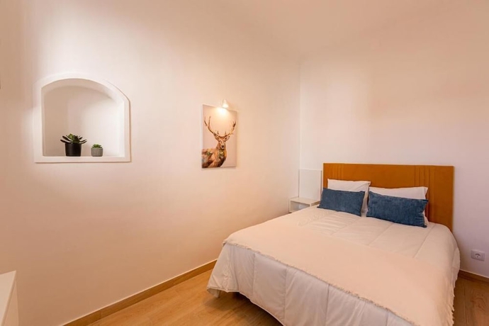 Imagen de la habitación del Hotel LUXURY PALM SUITES. Foto 10