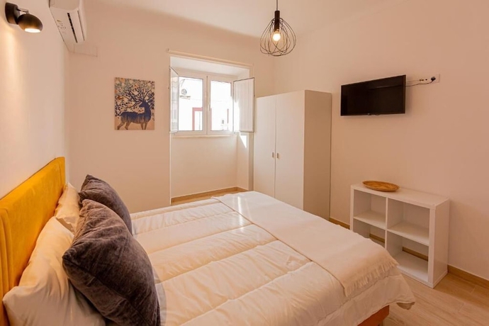 Imagen de la habitación del Hotel LUXURY PALM SUITES. Foto 11