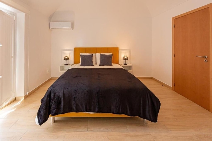 Imagen de la habitación del Hotel LUXURY PALM SUITES. Foto 12